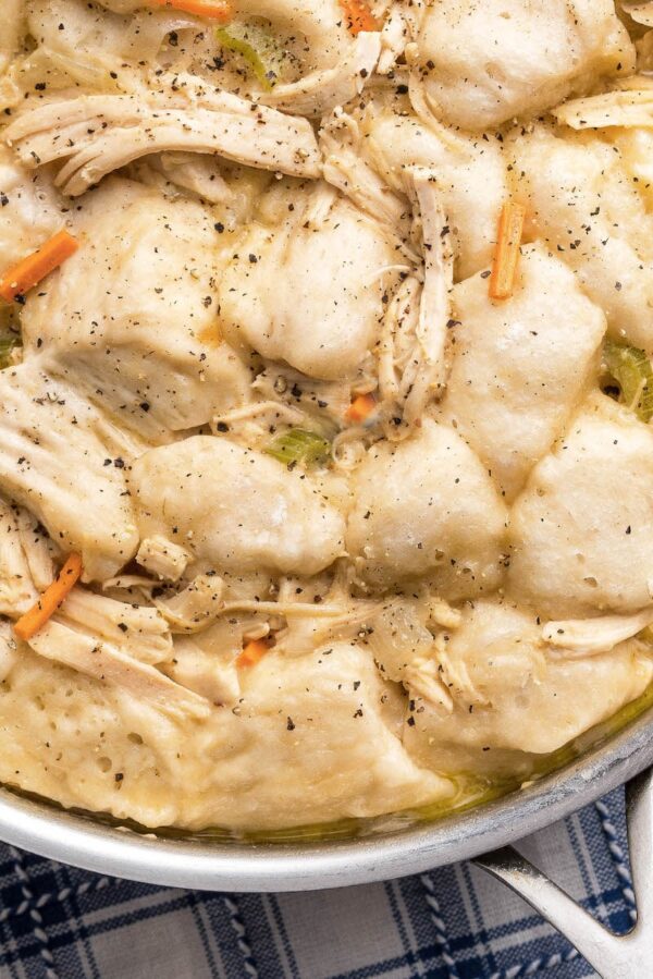 Up close image of easy chicken and dumplings in a skillet.