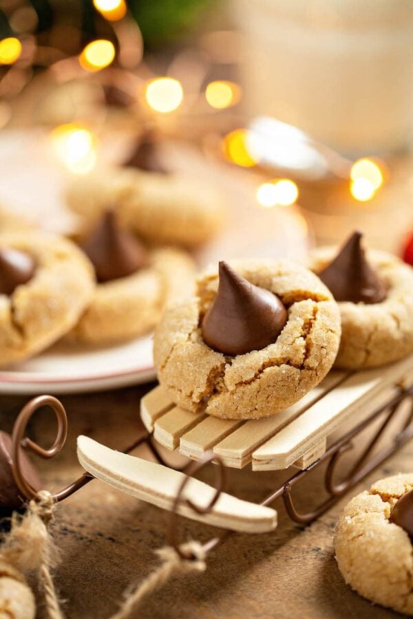 Peanut Butter Blossoms riding a sleigh ornament.