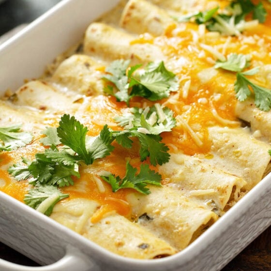 Close up of a tray with chicken enchiladas