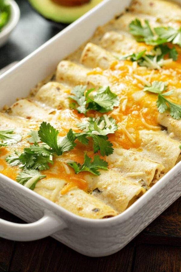 Close up of a tray with chicken enchiladas