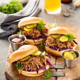 Slow Cooker Coca Cola Pulled Pork: my families favorite easy recipe made in a slow cooker or instant pot and only uses 5 ingredients! #slowcooker #crockpot #instantpot