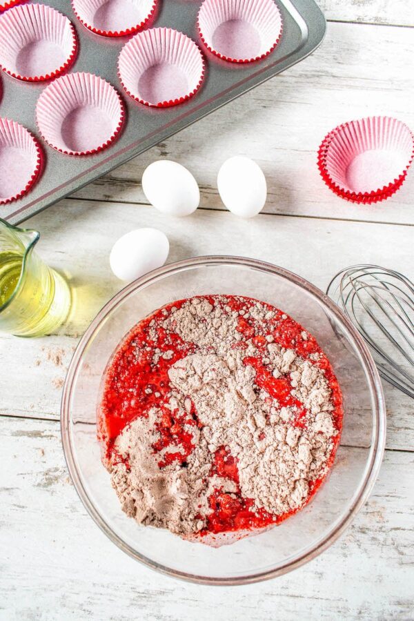 Mixing bowl with ingredients for red velvet cupcakes