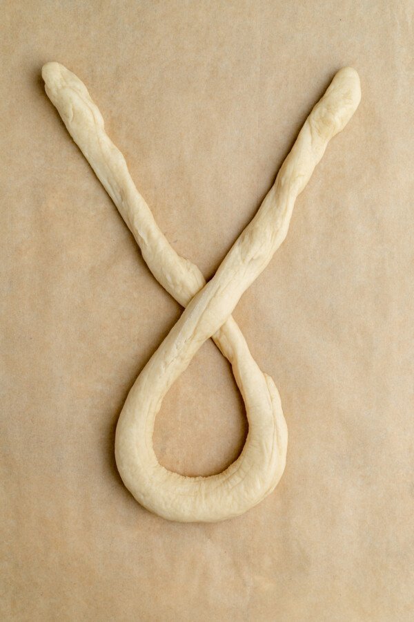 A long rope of dough, shaped into a loop.