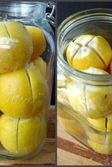 Lemons sliced and stacked in a jar.