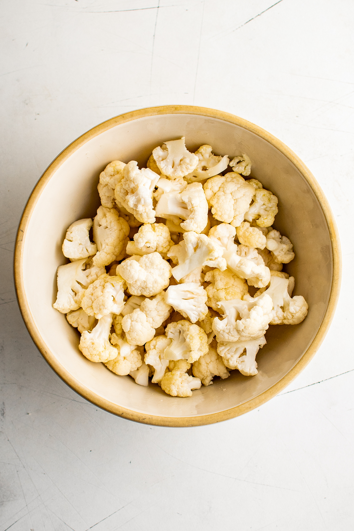 Cauliflower florets in a bowl.