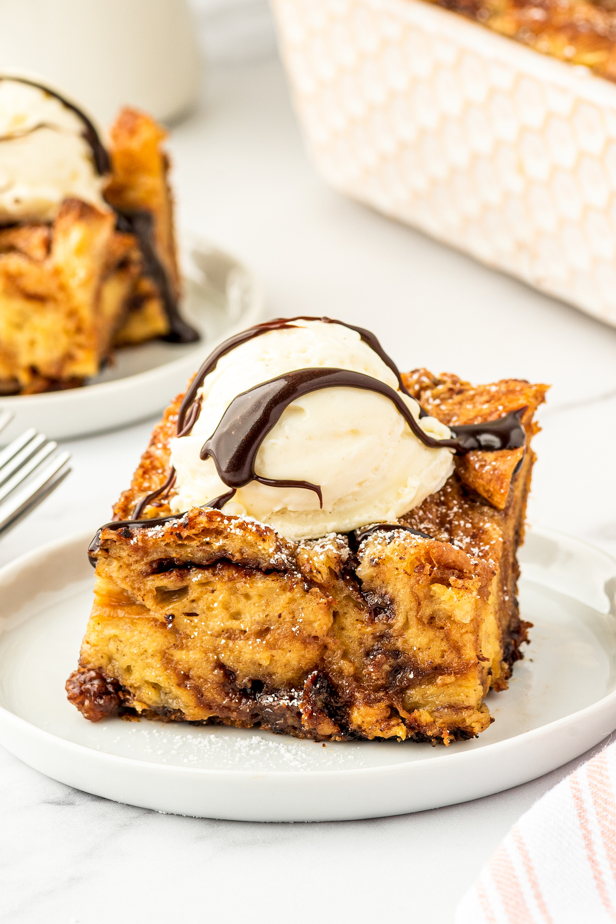 Bread pudding with Nutella streaked throughout, and an ice cream-Nutella topping.