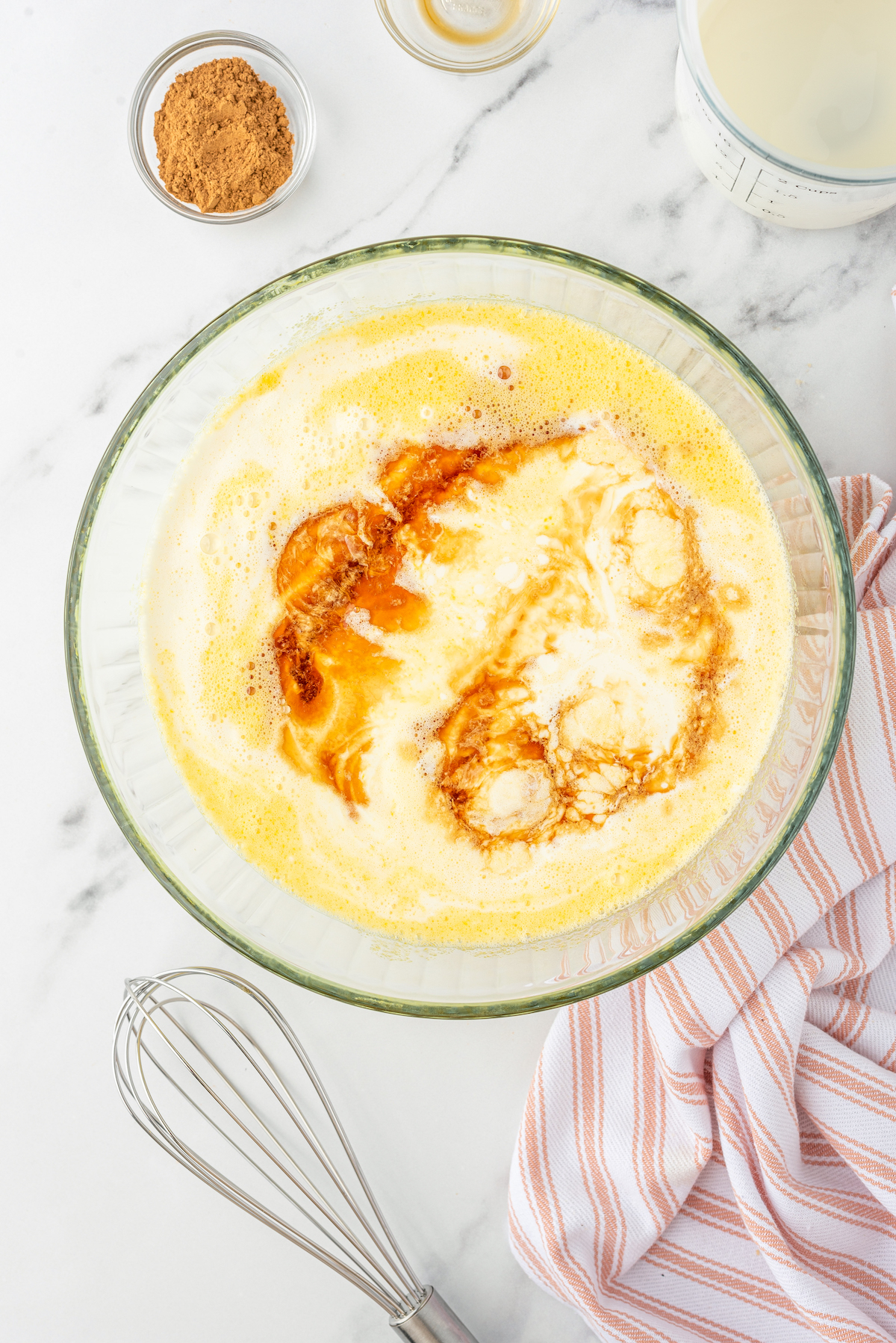 Custard ingredients in a large mixing bowl.