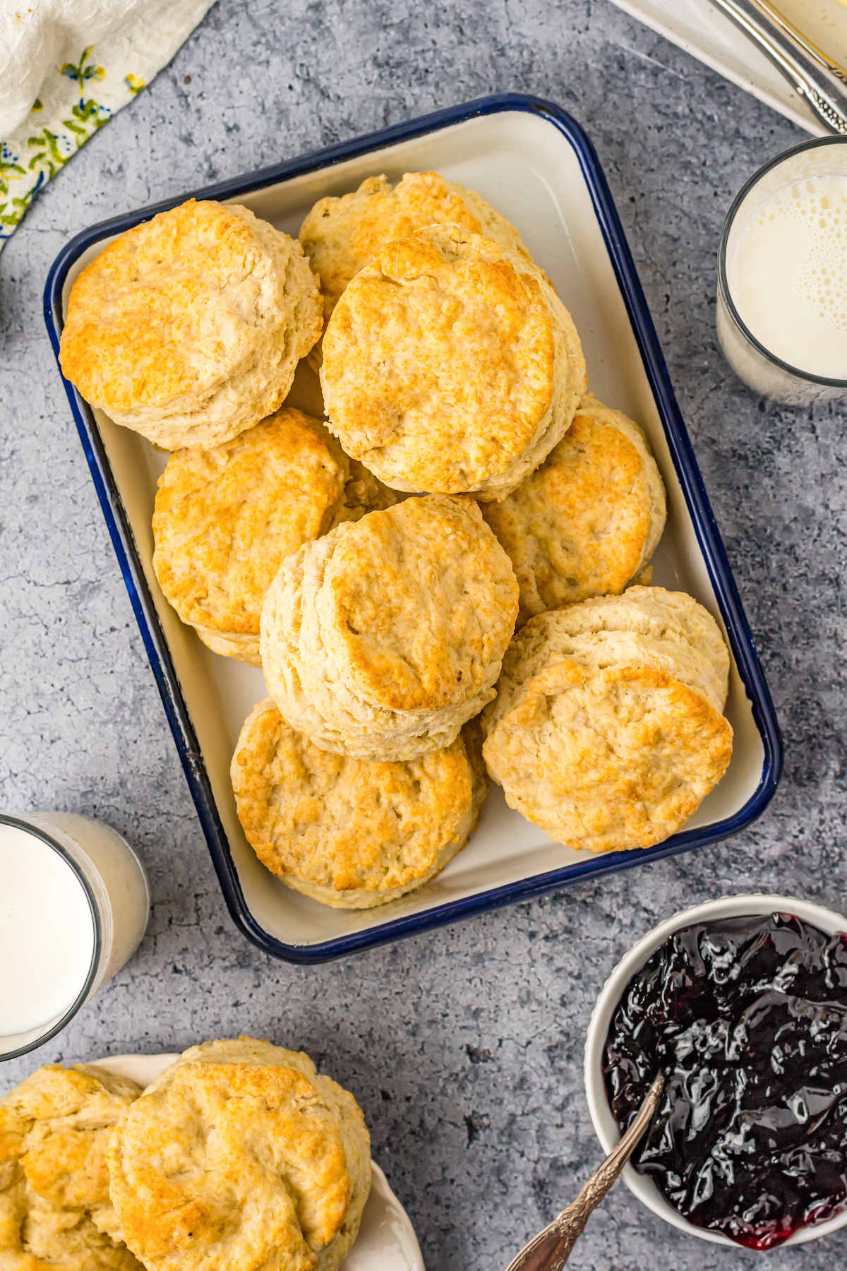 Overhead shot of a dozen biscuits on a small tray.