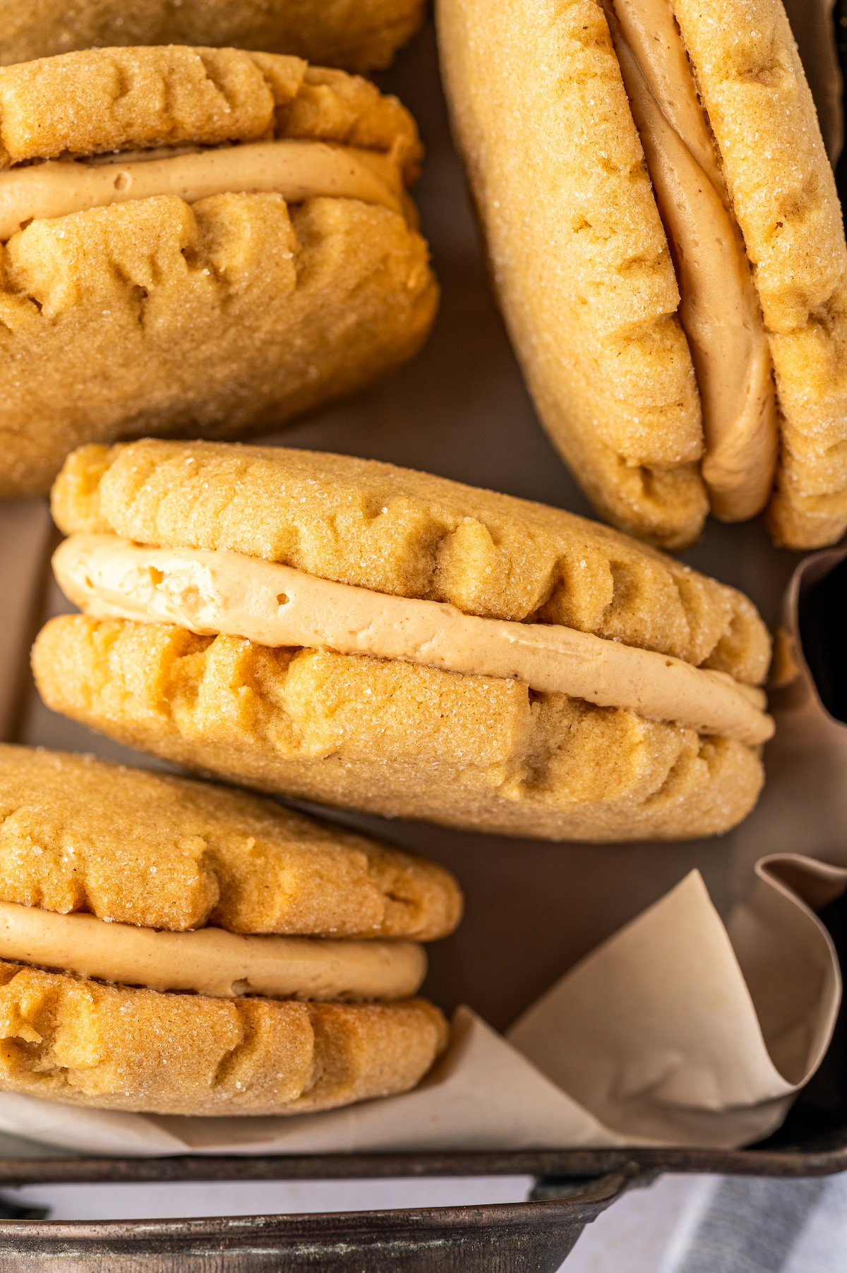 https://thenovicechefblog.com/wp-content/uploads/2011/12/Peanut-Butter-Sandwich-Cookies-1.jpeg