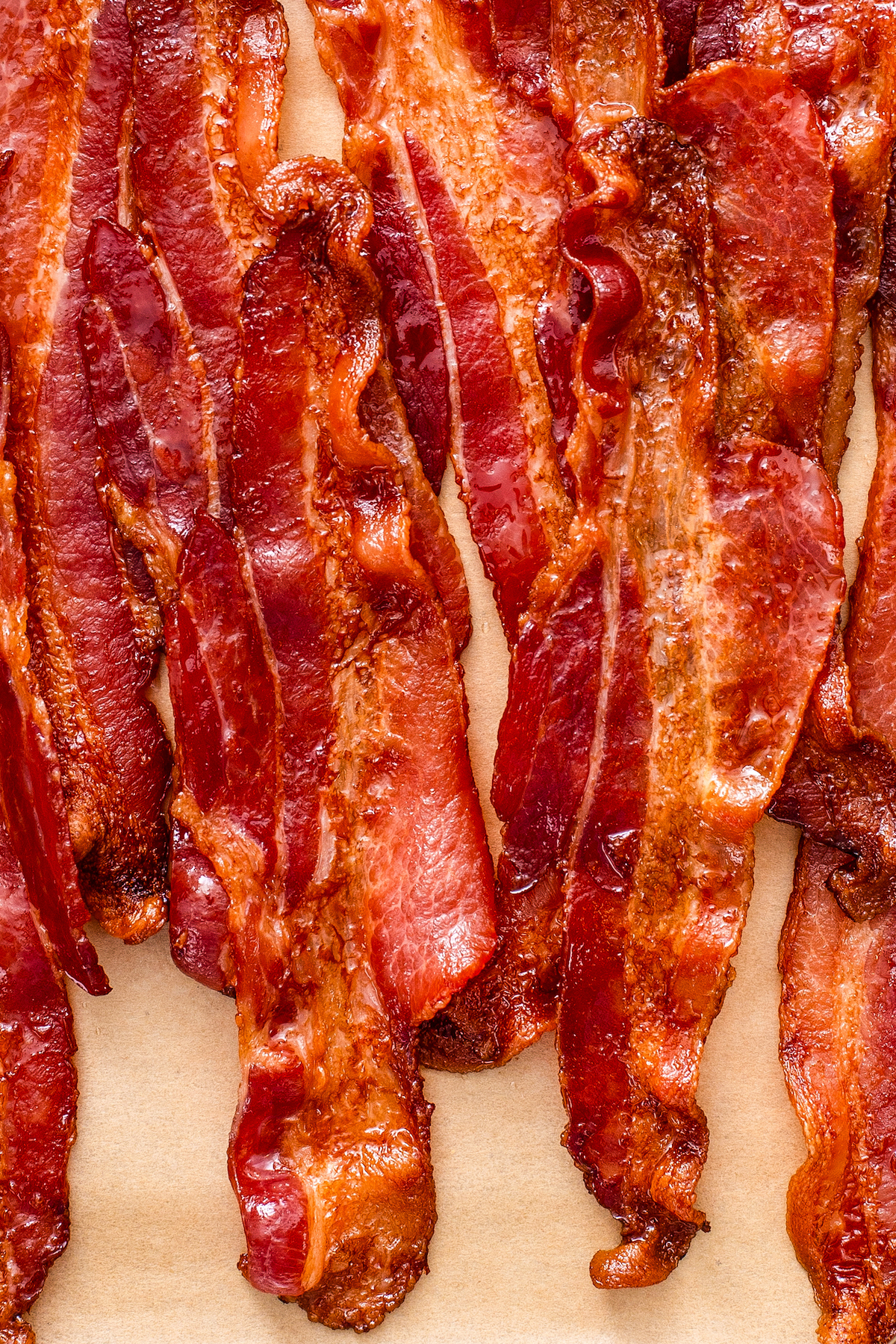 Up close image of strips of oven baked bacon.