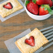 Baked pie crust pastry with fresh strawberries on top.