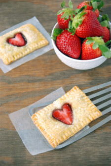 Baked pie crust pastry with fresh strawberries on top.