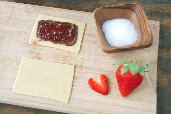 Nutella spread on a rectangle of pie crust.