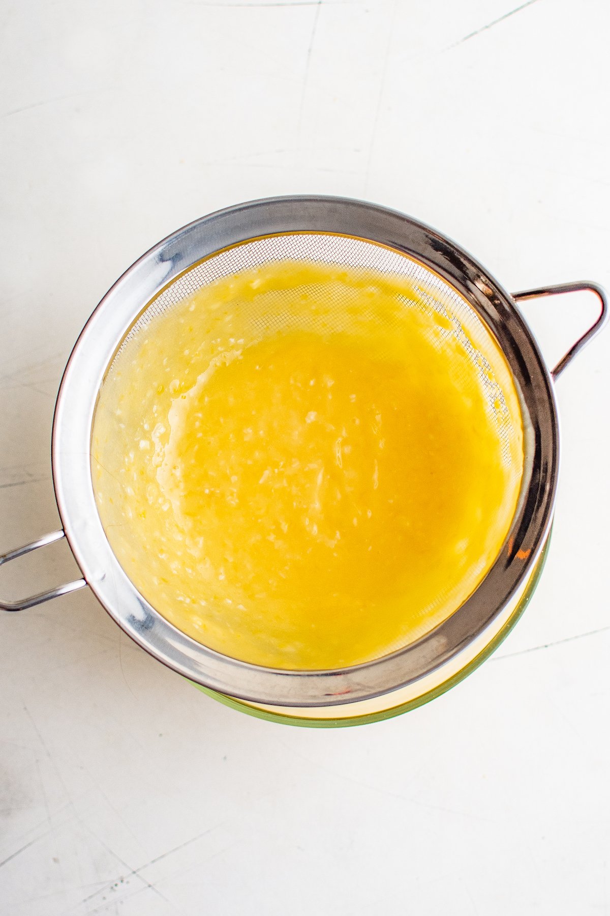 Lemon filling in a strainer.