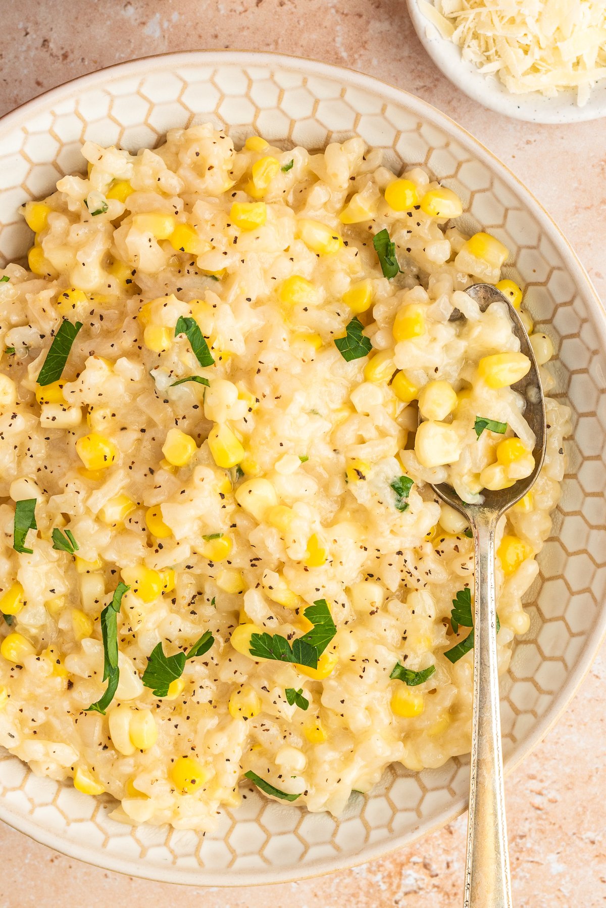 Sweet corn risotto on a serving plate.