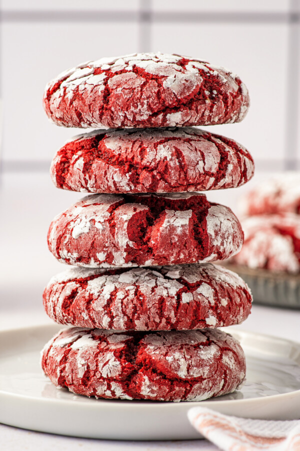 Red velvet cookies stacked on top of one another.