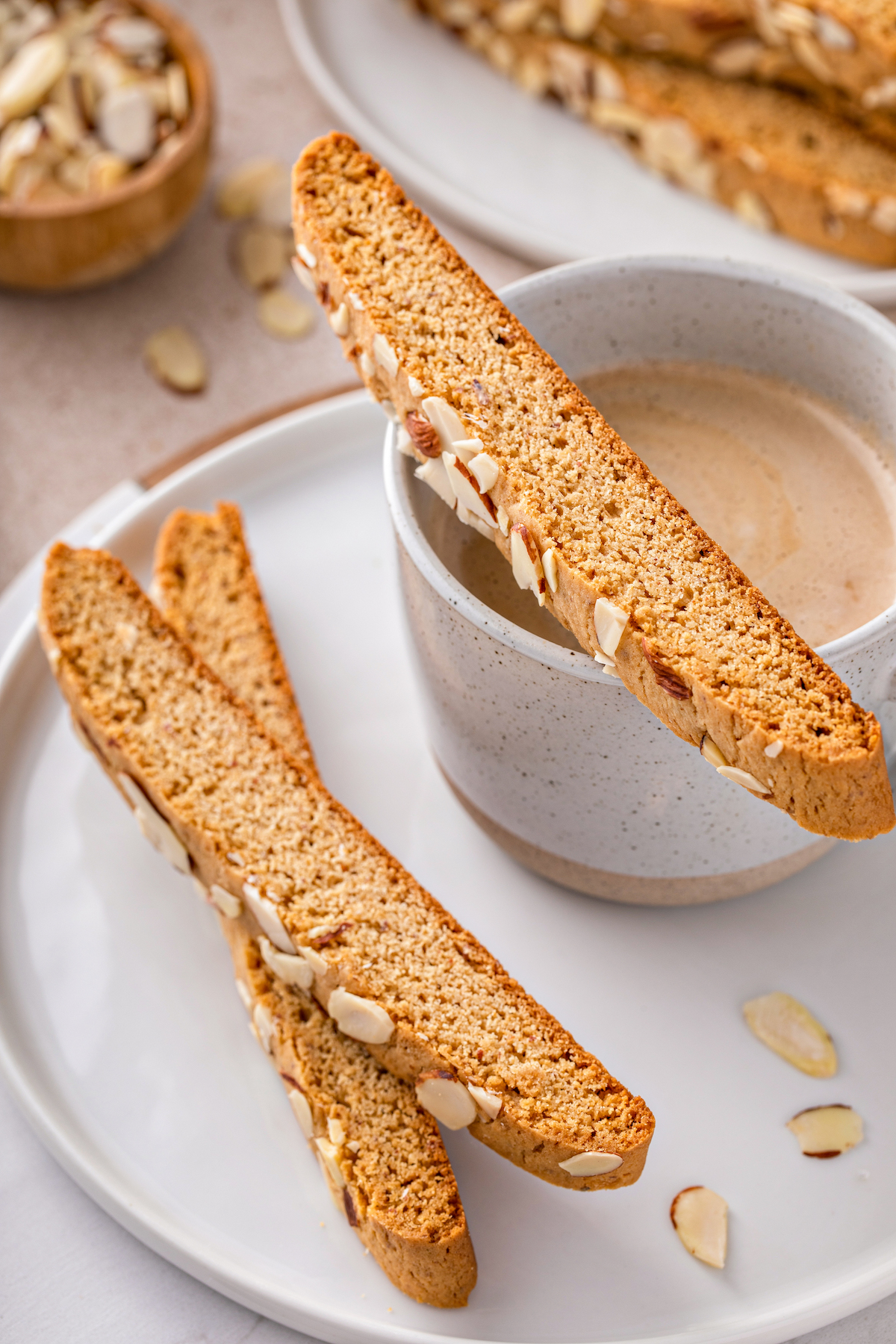 Almond biscotti with a cup of creamy coffee.