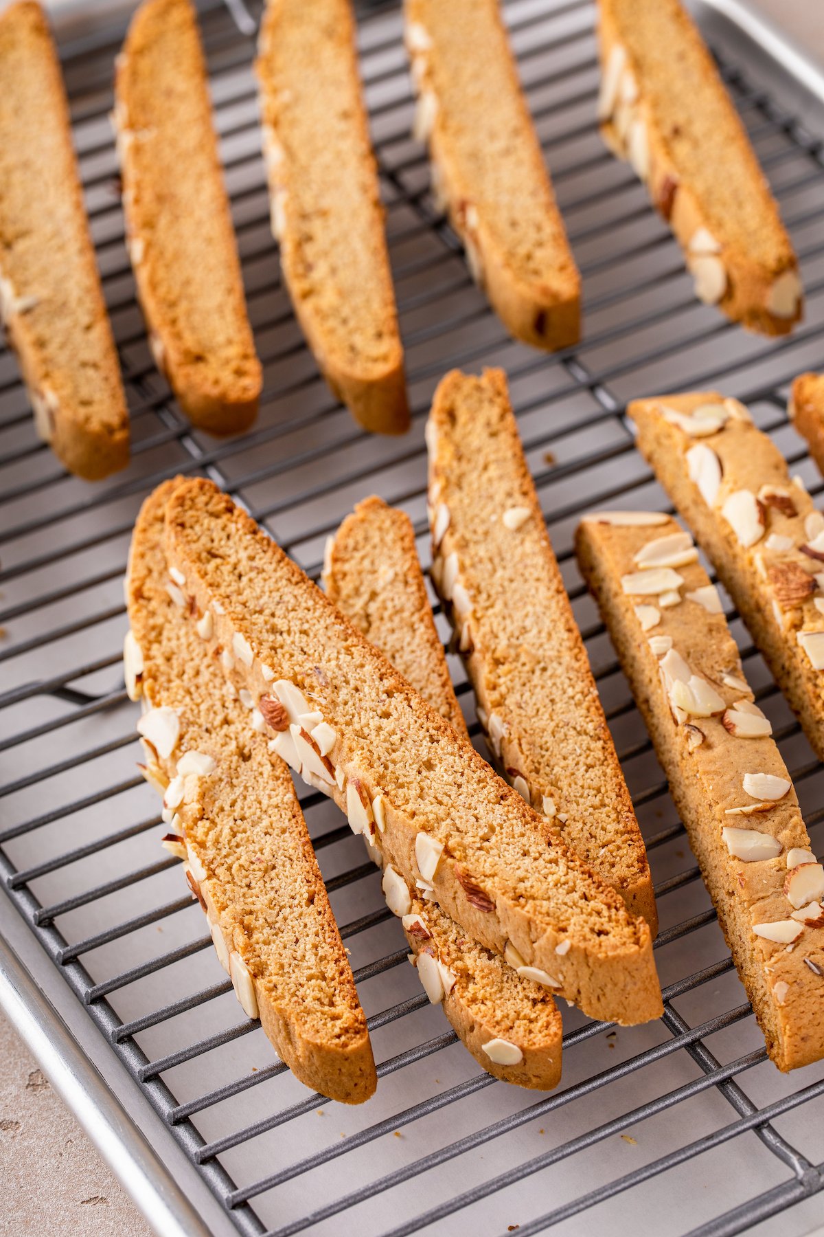 Biscotti cooling on a rack.