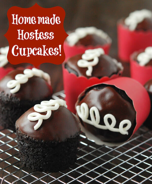 Homemade Hostess Cupcakes in red wrapper on a cooling wrack