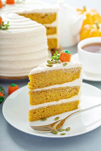 Pumpkin Dream Cake: three big layers of super moist pumpkin spiced cake, made completely from scratch, frosted with a sweet cinnamon maple cream cheese icing! #Pumpkin #Cake #Dessert #FallRecipes #PumpkinRecipes