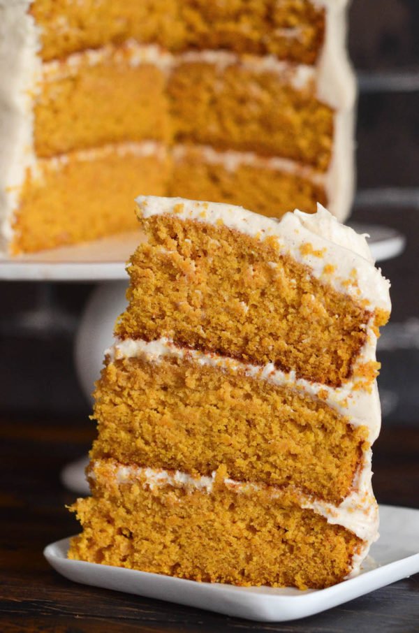 Pumpkin Dream Cake: three big layers of super moist pumpkin spiced cake, made completely from scratch, frosted with a sweet cinnamon maple cream cheese icing! #Pumpkin #Cake #Dessert #FallRecipes #PumpkinRecipes