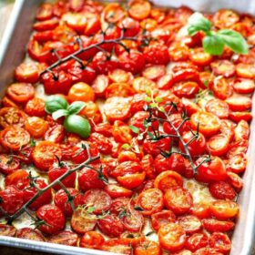 Roasted Cherry Tomatoes on a sheet pan.