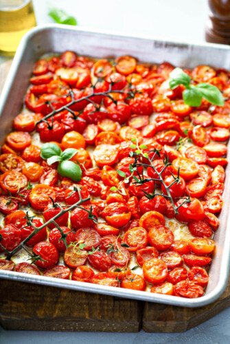Roasted Cherry Tomatoes on a sheet pan.