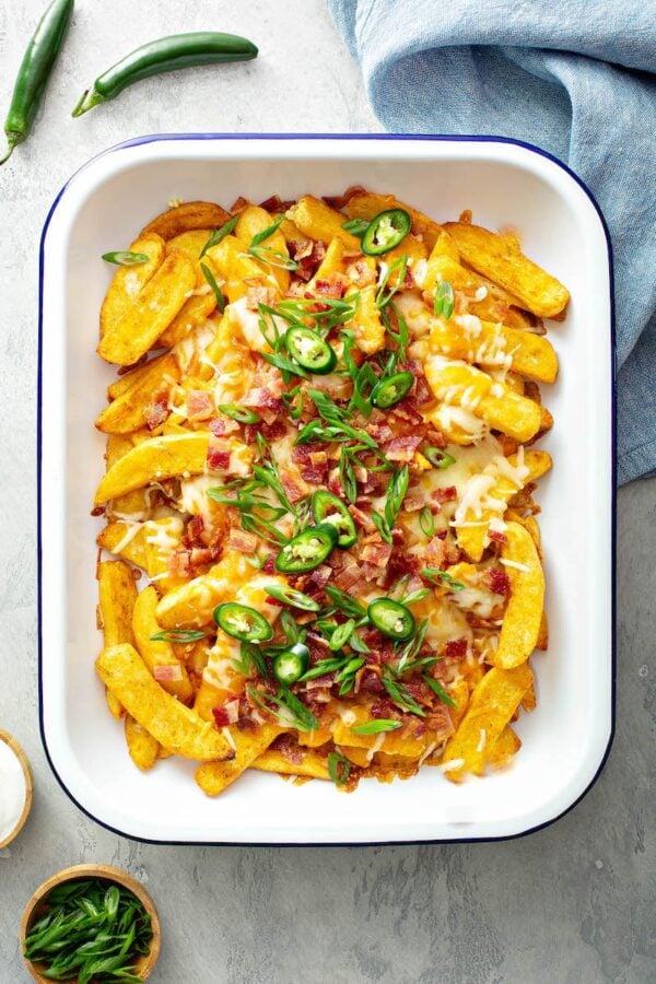 Cheese Fries in a casserole dish.