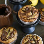 Nutella Banana swirl muffins in wrappers.