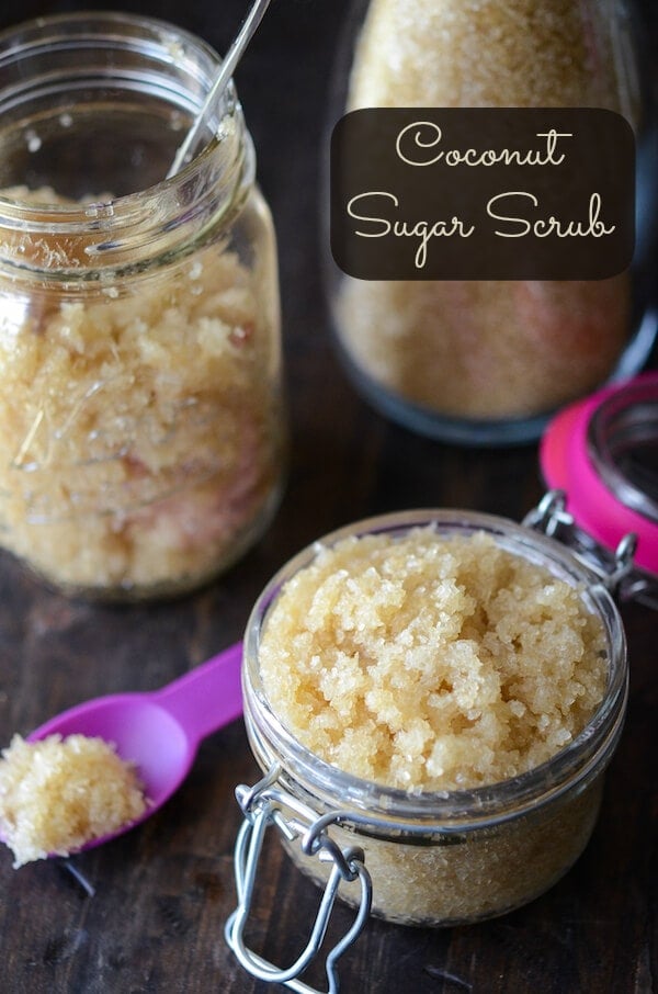 Three Glass Jars Filled with Homemade Sugar Scrub on a Table