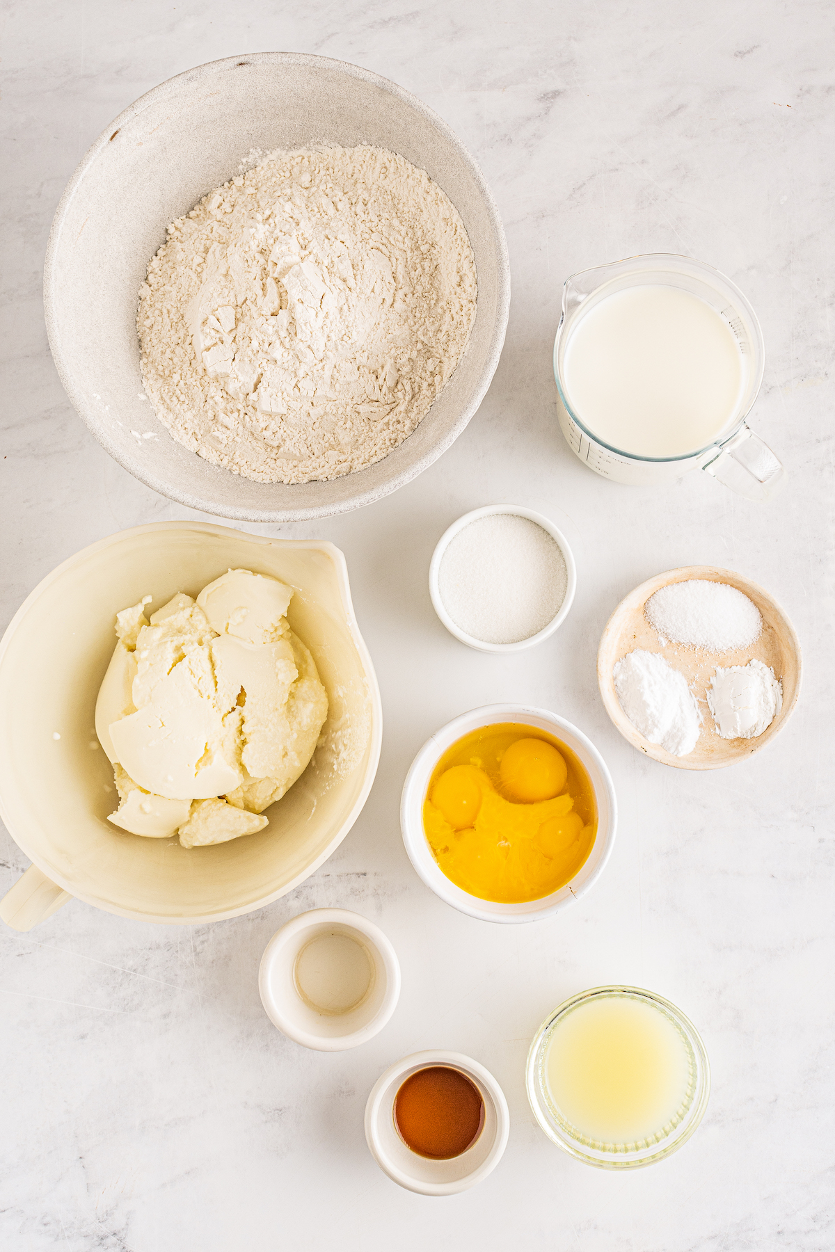 From top: Flour, sugar, milk, ricotta cheese, baking soda, baking powder, salt, eggs, melted butter, lemon juice, vanilla.