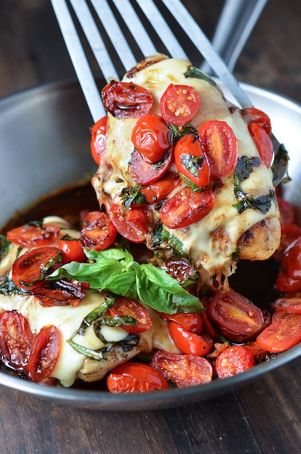 CAPRESE CHICKEN: the original perfect one pan, 30 minute, LOW CARB healthy weeknight dinner! Warm sautÃ©ed garlic tomatoes with basil, fresh mozzarella and balsamic vinegar!