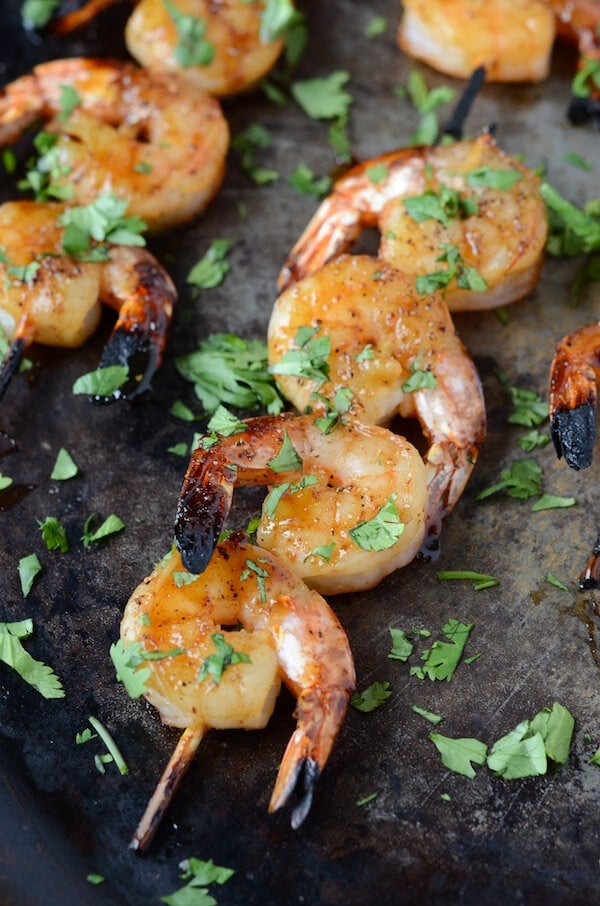 Sheet pan of Sweet & Sticky Shrimp skewers