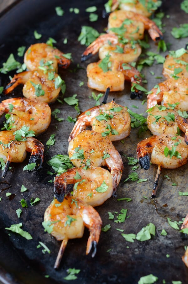 Sheet pan of Sweet & Sticky Shrimp skewers