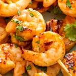 Landscape photo of shrimp skewers.
