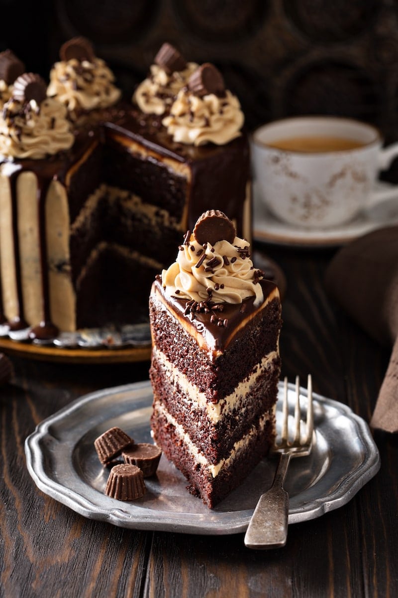 Slice of Chocolate Peanut Butter Cake on a plate.