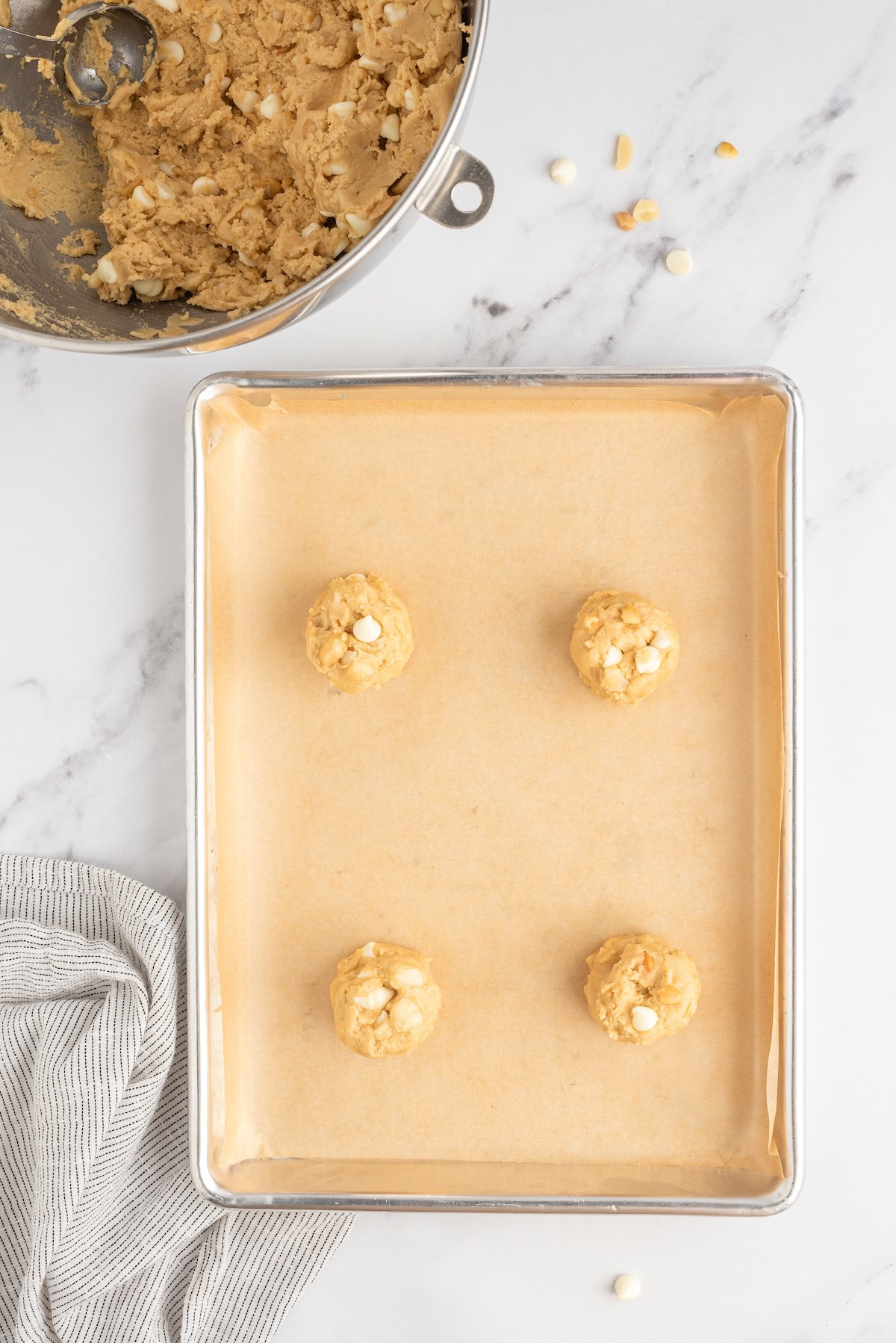 Unbaked cookies on a baking sheet.