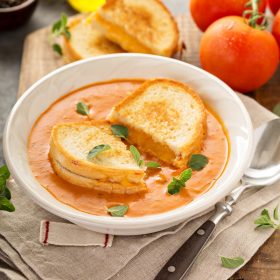 Panera Creamy Tomato Soup Copycat Recipe: this simple recipe is my families favorite creamy tomato soup when served with a big buttery grilled cheese sandwich!