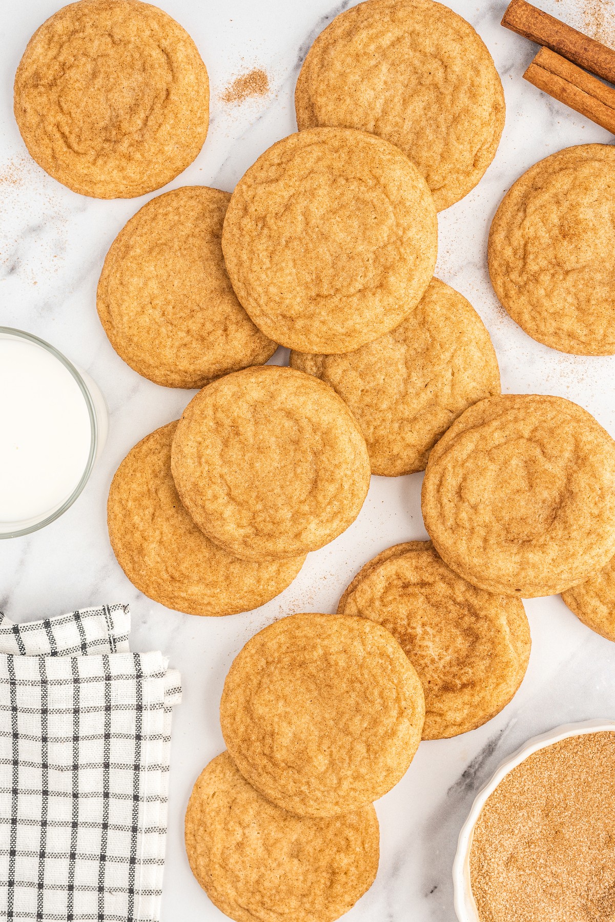 Overhead view of chewy snickerdoodles spread out on the countertop.