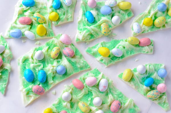 Nine Pieces of Easter Egg Bark Candy on a White Surface