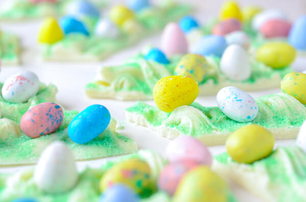 Pieces of White Chocolate Bark for Easter on a White Countertop