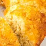 A pineapple-topped ring-shaped cake.