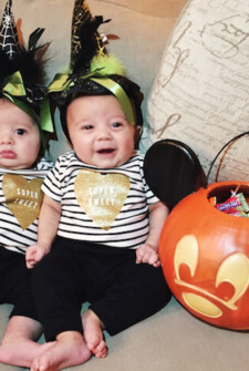 Twin girls first halloween in black and white outfits