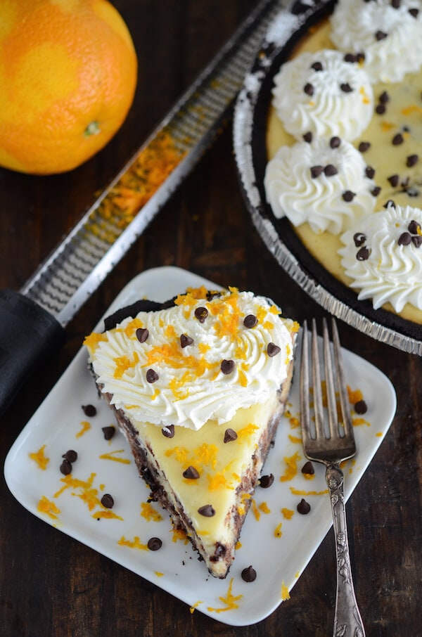 Cannoli Cheesecake (made with fresh orange zest and mini chocolate chips!) recipe via www.thenovicechefblog.com