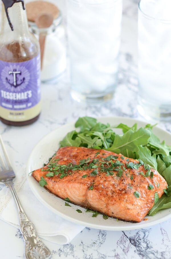 Balsamic Roasted Salmon on a white plate with a fork