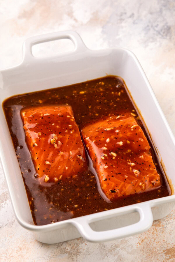 Salmon filets covered in balsamic marinade. 