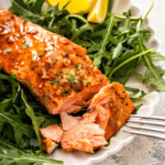 Digging into some flaky, balsamic salmon with an arugula salad on the side.
