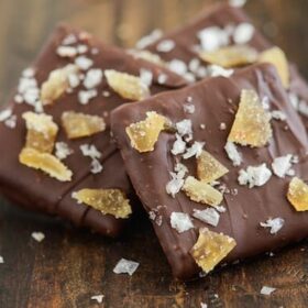 Chocolate covered Sea Salt and Crystallized Ginger Chocolate Wafers on a wooden surface