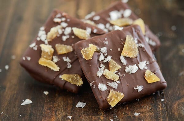 Chocolate covered Sea Salt and Crystallized Ginger Chocolate Wafers on a wooden surface