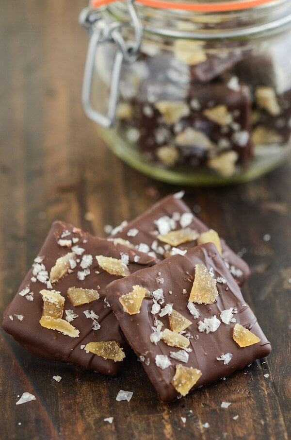 Chocolate covered Sea Salt and Crystallized Ginger Chocolate Wafers on a wooden surface